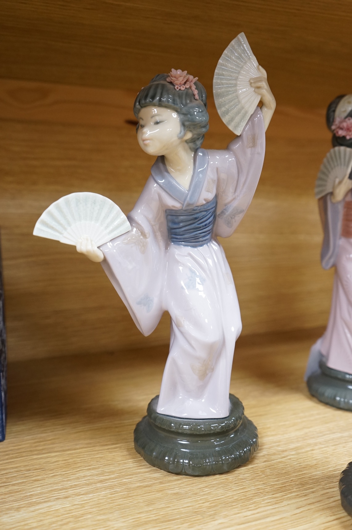 Four Lladro models of Geishas, tallest 30cm
